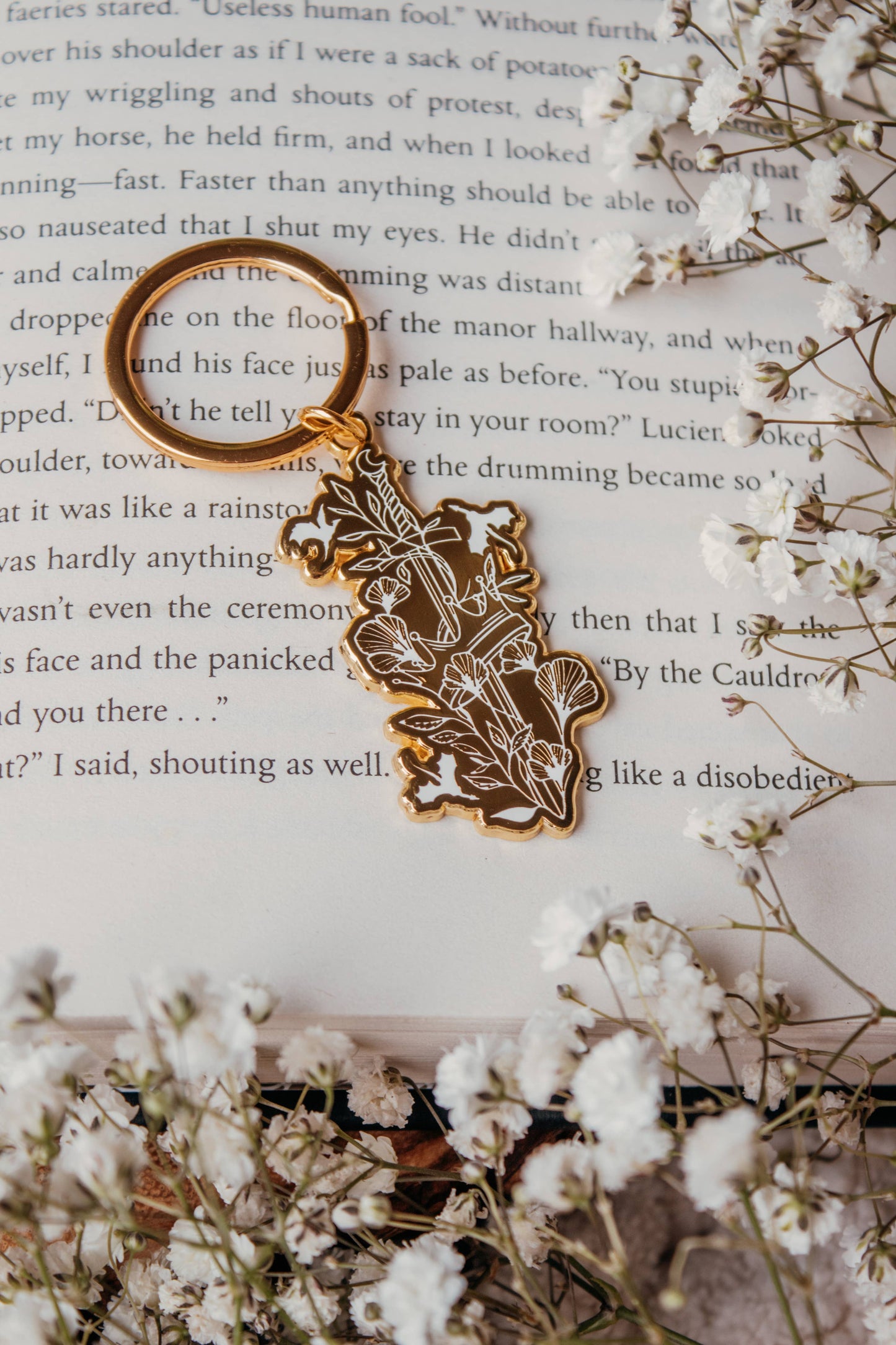 Ivory Sword Fantasy Reader Enamel Keychain