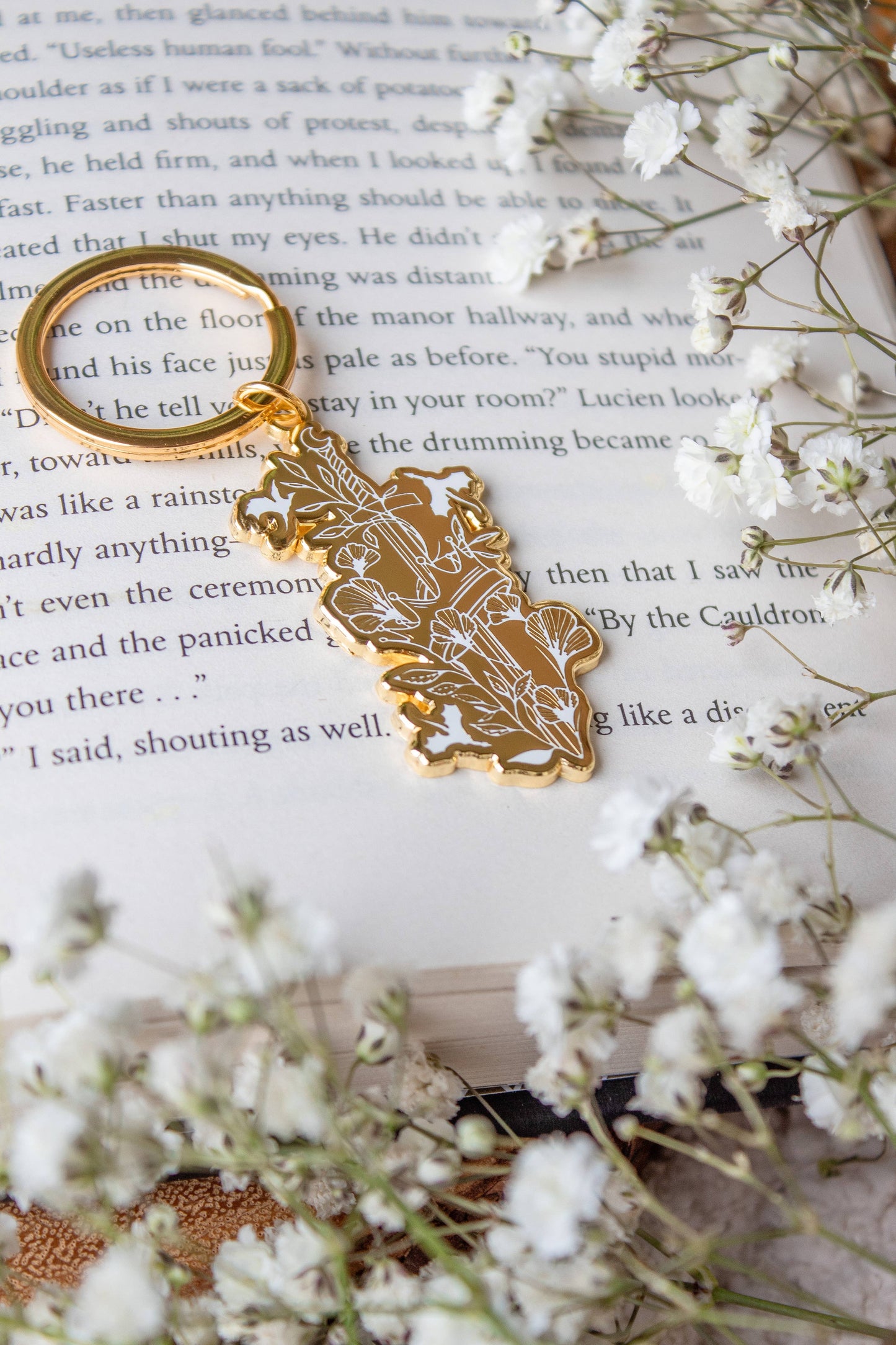 Ivory Sword Fantasy Reader Enamel Keychain