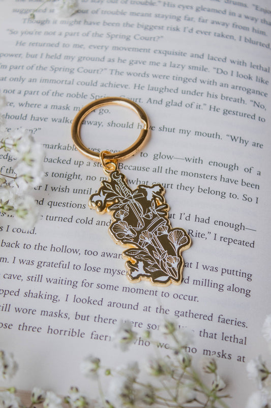 Ivory Sword Fantasy Reader Enamel Keychain